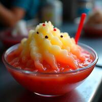 Refreshing Frozen Drink in Glass Bowl with Colorful Flavors photo
