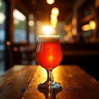 Glass of Refreshing Ale on Wooden Table with Soft Backlighting photo