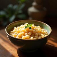 Bowl of Round Dumplings with Fresh Mint Garnish photo