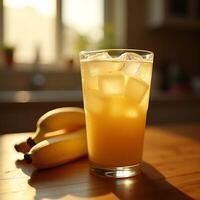 Refreshing Fruit Juice with Ice and Banana on Wooden Table photo
