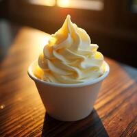 Serving of Soft Serve Dessert in Cup on Wooden Table photo