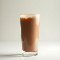 Serving of Chocolate Milk in a Glass on White Background photo