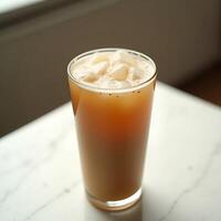 Iced Drink Refreshment in Glass on Marble Surface photo