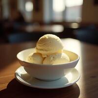 Scoops of Vanilla Ice Cream in Bowl on Table photo