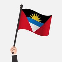 Hand Holding Antigua and Barbuda Waving Flag vector