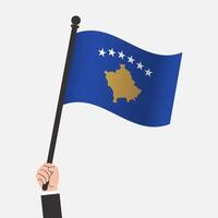 Hand Holding Kosovo Waving Flag vector