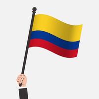 Hand Holding Colombia Waving Flag vector