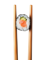 Wooden chopsticks with fresh sushi roll with salmon, cucumber and rice, isolated on transparent background png