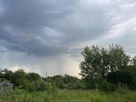 Dark storm clouds gathering before rains photo