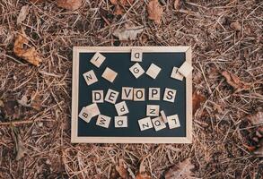 Blackboard with DevOps written on it photo