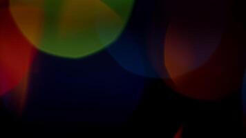 Multicolored light leaks 4k footage on black background. Lens studio flare leak burst overlays. Natural lighting lamp rays bokeh effect. For compositing over your footage, stylizing , transitions. video