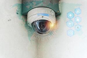 Smart surveillance security camera with futuristic interface and digital data icons for monitoring and protection photo