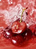 Cherries are being splashed in water photo