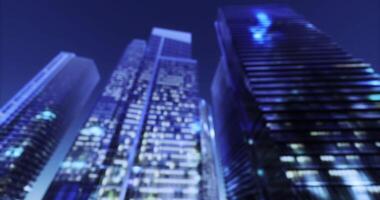 CGI City skyline illuminated by evening lights and reflections in glass buildings video