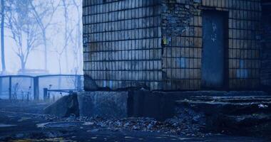 CGI Urban decay in a misty environment near an abandoned building at dusk video