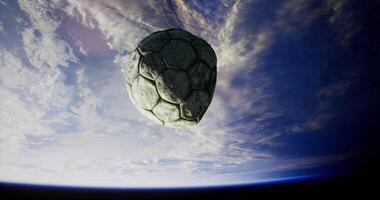 CGI Soccer ball floating in space above Earth with stunning cloud formations video