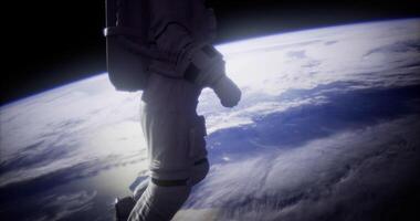 CGI Astronaut exploring outer space above Earth during a spacewalk video