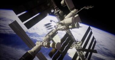 CGI Space station orbiting Earth with solar panels deployed and a backdrop of space video