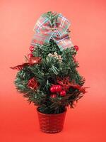 christmas tree over a red background photo