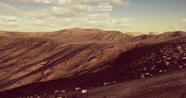 CGI Explore the barren landscape of rugged mountains under a bright sky video