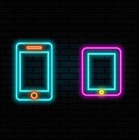 Set of icons of high technology devices tablet PC, mobile phone, laptop. neon style. illustration image. vector