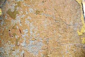 Yellow Grunge Wall Texture Background with Concrete photo