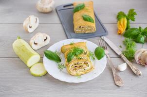 Delicious zucchini appetizer with cheese filling photo