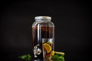 Homemade kombucha starter with kombucha on a black background photo