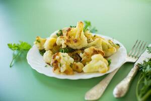 Rustic vegetable dish with cabbage and herbs . photo