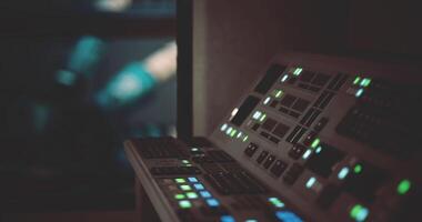 CGI Control panel illuminated by green lights in a dark environment video