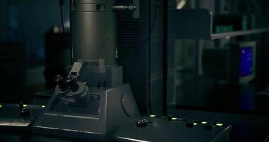 CGI High tech laboratory equipment in a dimly lit research facility video