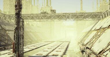 CGI Abandoned industrial landscape with overgrown facilities at dusk video