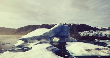 CGI Icebergs floating in a serene Arctic landscape during sunset hours video