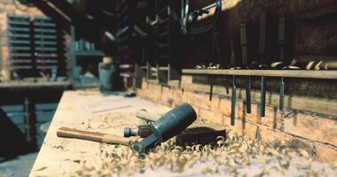 CGI Woodworking tools and shavings arranged on a workshop table in a rustic setting video