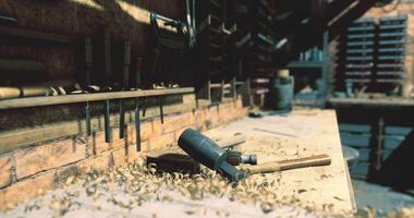 CGI Woodworking tools and shavings scattered in a rustic workshop setting video