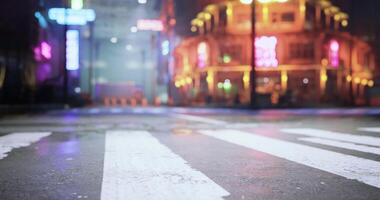 CGI A bustling city street glows with colorful neon lights at night video