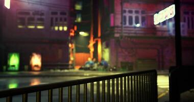 CGI Nighttime urban setting with neon lights and a gathering of people video