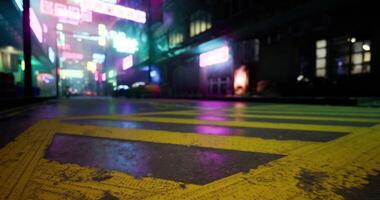 CGI Urban night scene with neon lights and wet pavement reflecting colors video