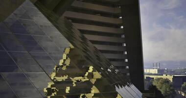 CGI Modern architecture showcases reflective surfaces in urban environment video