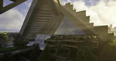 CGI Modern architectural structure showcasing pyramid design amidst green landscape video