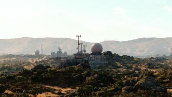 The CGI Military base nestled in mountainous terrain during daylight hours video