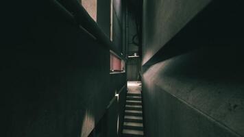 The CGI Exploring the dark concrete corridors of an industrial building at dusk video