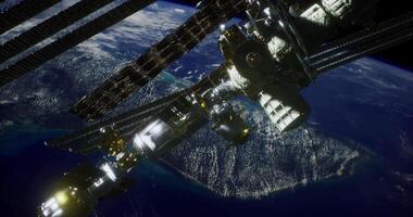 The concept of CGI View of the International Space Station orbiting Earth at night video