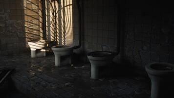 CGI Abandoned restroom with old toilets in a dimly lit setting video