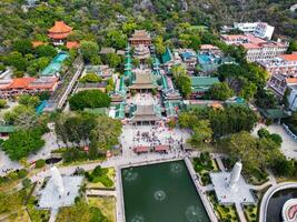 XIAMEN, CHINA - FEB 14, 2025-An aerial view of The Nanputuo Temple is a famous Buddhist temple in the Southeast coast of China, located on Xiamen island., Fujian Province. photo