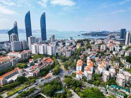 XIAMEN, CHINA -FEB 14, 2025 -An aerial view of Shimao Twin Tower, the landmark in Xiamen, Fujian Province, China photo