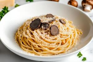 Delicious Spaghetti With Truffle and Parmesan Served on a White Plate With Fresh Herbs and Mushrooms. photo