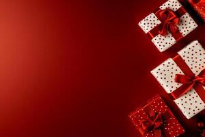 Festive Red and White Gift Boxes Arranged on a Solid Background During the Holiday Season photo