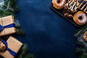 Delightful Holiday Treats and Gifts Arranged on a Festive Table With Green Foliage Accents photo
