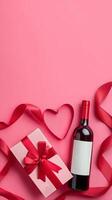 Wine Gift and Ribbon Decoration for Special Occasion Celebration in Bright Pink Setting photo
